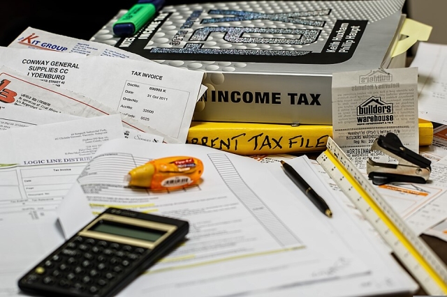 Income Taxes and Tax Papers on a Desk