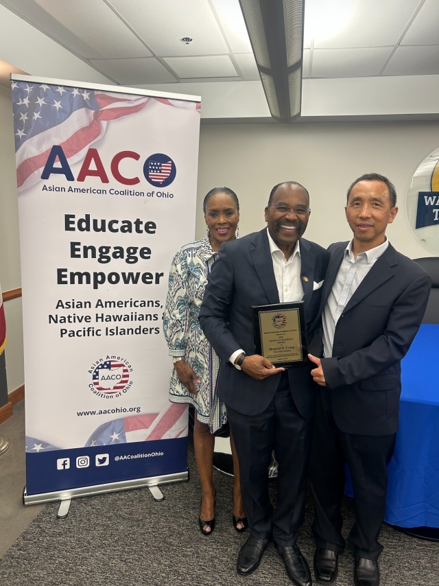 Senator Craig poses with his wife, Linda Craig, and Vincent Wang, chair of AACO.