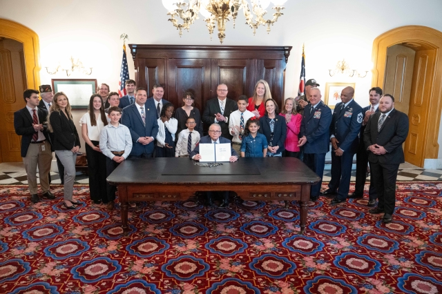 Governor Signs Timken, Roegner Bill Designating August 26th As Abbey Gate Remembrance Day